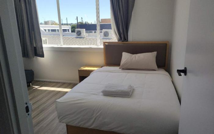 Three Double, 4 Single, 2 Sofa Bed, Suite 1