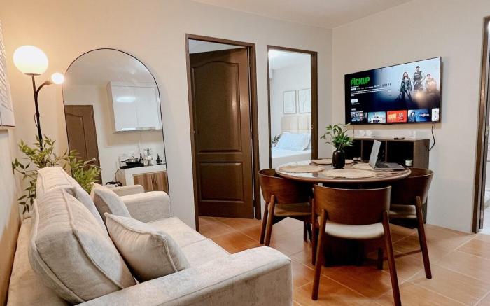 Two Bedroom Condo w Pool & WiFi Near Mall & Restos