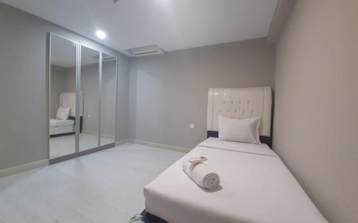 Cozy Loft 2BR Grand Jati Junction Apt By Travelio