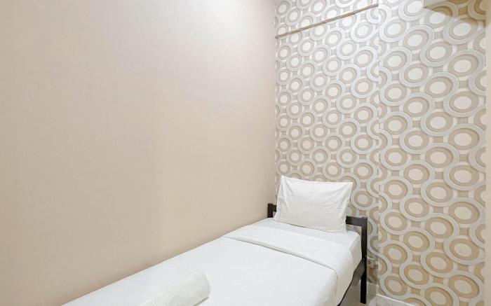 Simple Style 2BR Apt Vida View Makassar ByTravelio