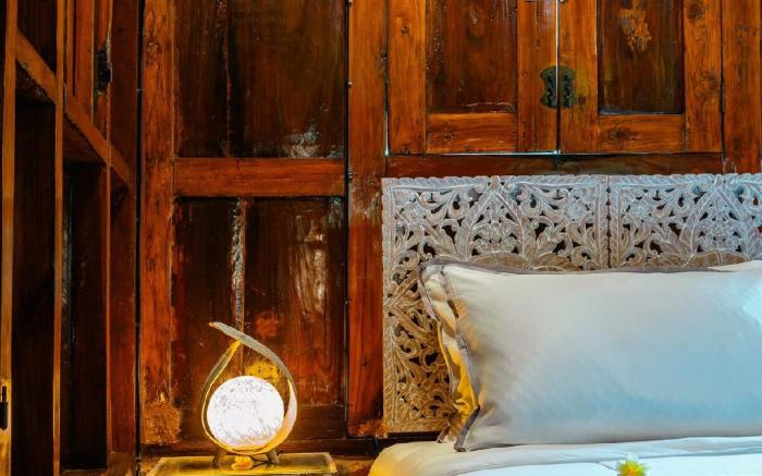 Jungle Wooden House By The River in Ubud