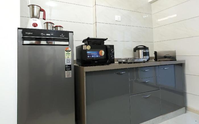 Mumbai 1BHK | Living Room + Kitchen | Near Airport