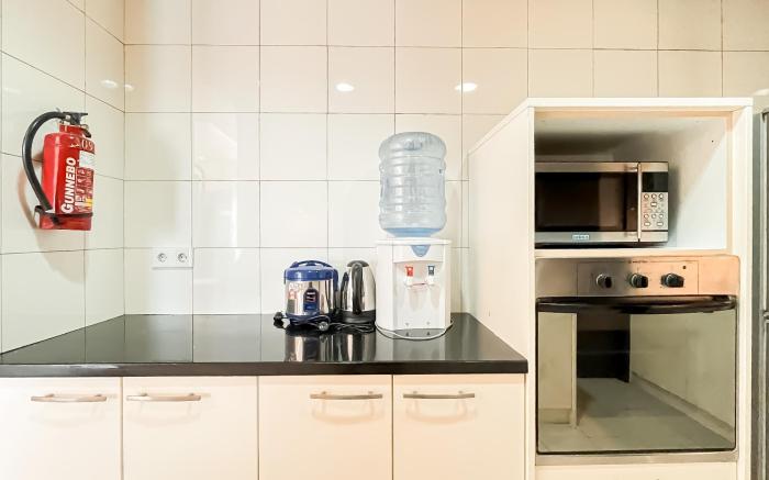 Contemporary 2BR Apt Somerset Berlian By Travelio