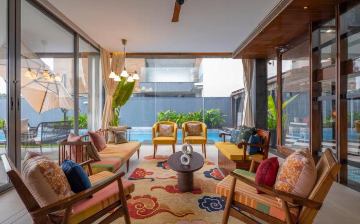 SaffronStays Candolim Deck Luxe 3BR Poolside Villa