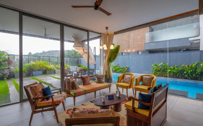 SaffronStays Candolim Deck Luxe 3BR Poolside Villa