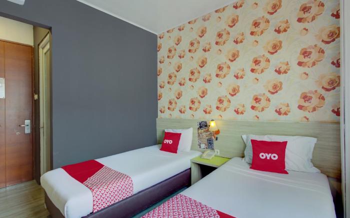 Capital O 94792 Aleander Hotel