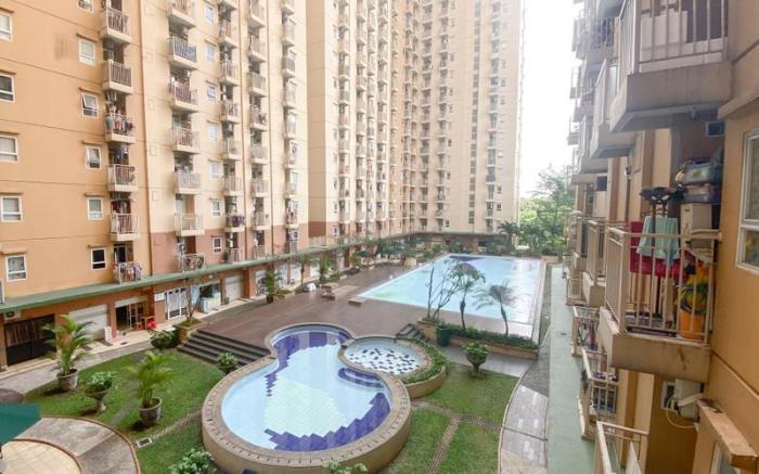 Basic 2BR Apt at Green Palm Residence By Travelio