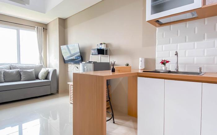 Modern Look 1BR Apt Royal Sentul Park By Travelio