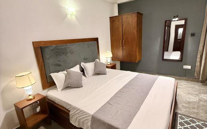 Grey Home Villas by ‘R Dodwell’