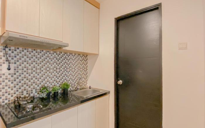 Comfortable 1BR Belmont Residence Puri By Travelio