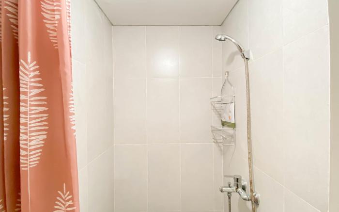 Cream Tone 1BR Royal Sentul Park Apt By Travelio