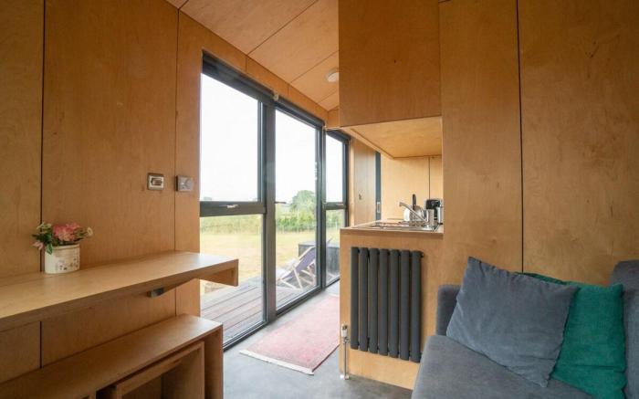 Merlin: Timber Tiny Home + Pub