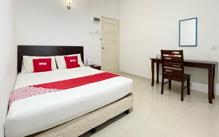 OYO 275 Senyum Inn