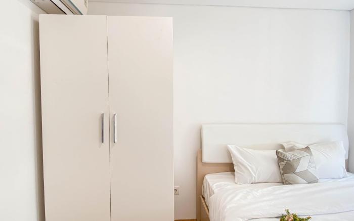 Contemporary 1BR at Vittoria Residence By Travelio