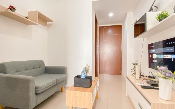 Basic 1BR at Vittoria Residence Apart By Travelio