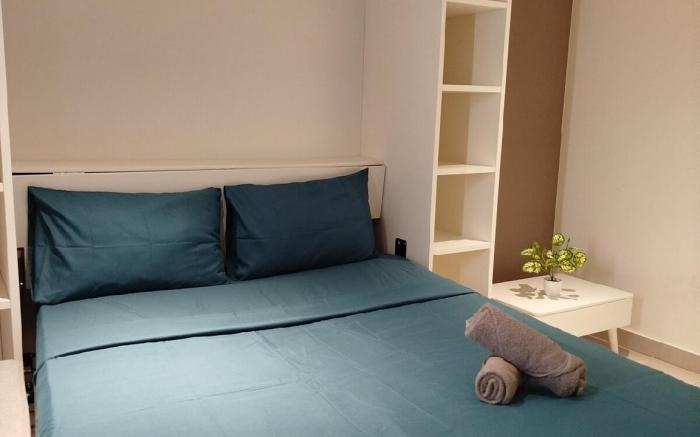 Simple Queen Studio with Balcony by ComfyAsia