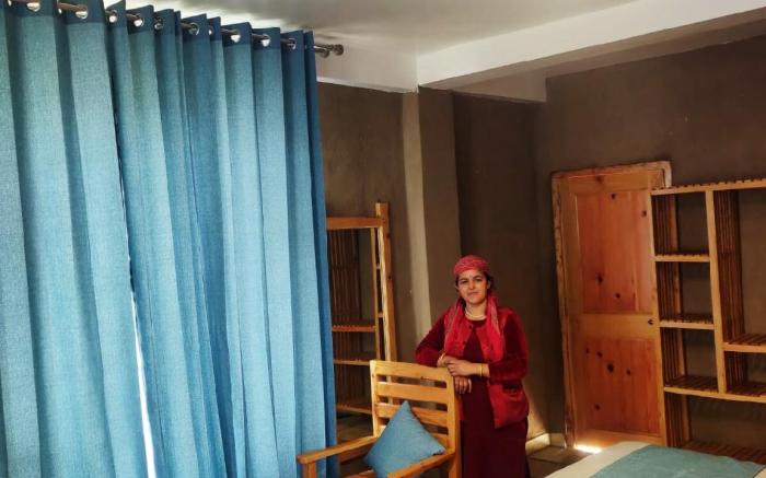 Mudhouse room with valley view