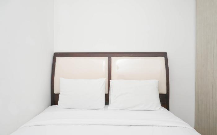 Spacious 2BR Green Bay Pluit Apartment By Travelio