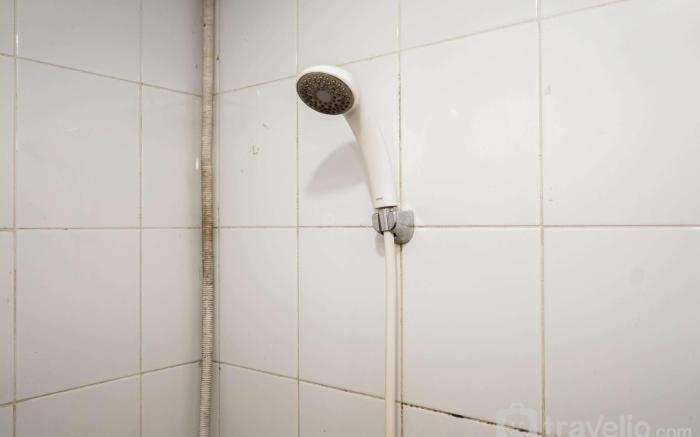 Comfy and Clean 2BR Green Pramuka Apt By Travelio
