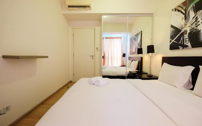 Homey 2BR Apt @ Casa Grande Residence By Travelio