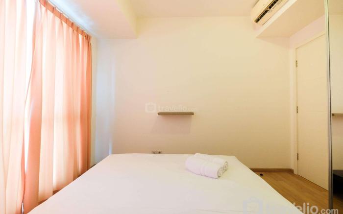 Homey 2BR Apt @ Casa Grande Residence By Travelio