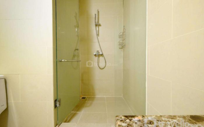 Homey 2BR Apt @ Casa Grande Residence By Travelio