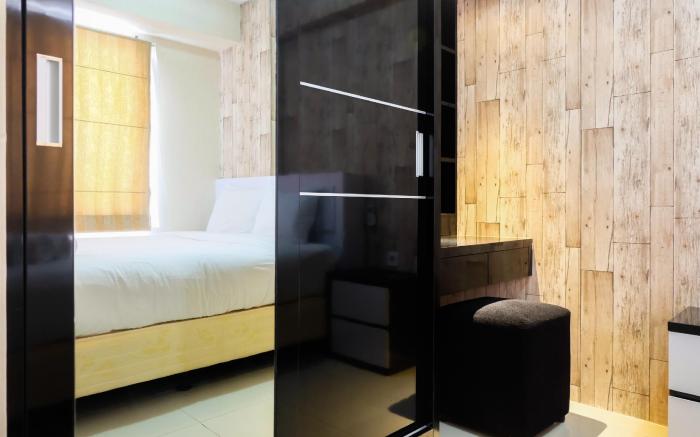 Modern 2BR with City View at Bassura Apartment By Travelio