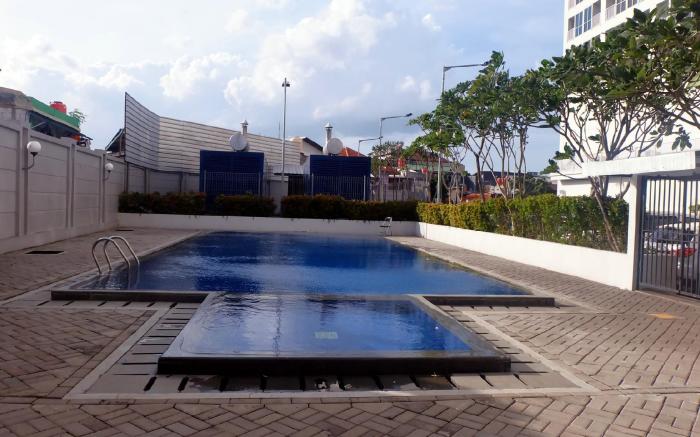 Studio near Mall at Tifolia Apartment By Travelio