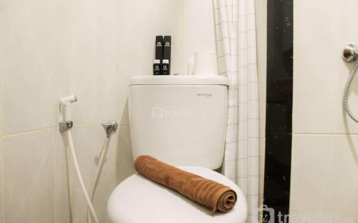 Cozy 1BR Apartment Grand Kamala Lagoon By Travelio