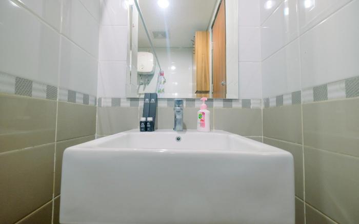 Modern and Cozy 2BR Royal Olive Apt By Travelio