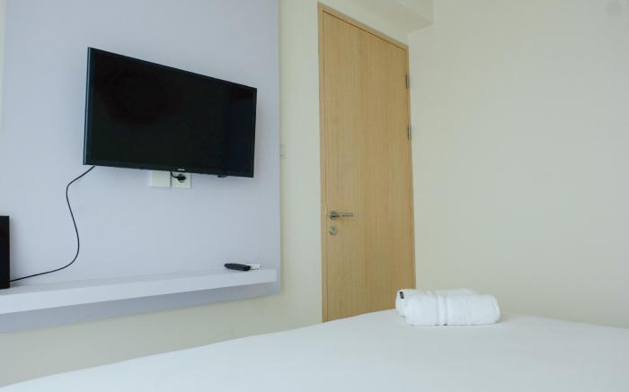 Compact 1BR at Tree Park Apartment By Travelio