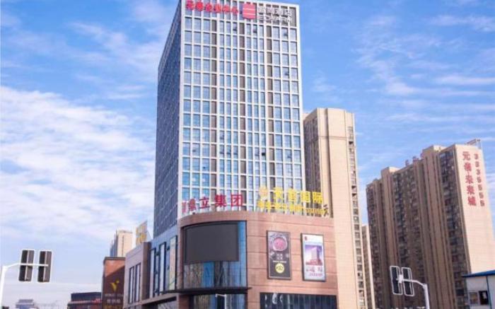 Echarm Hotel Xiantao Yuantai Weilaicheng