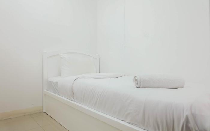Pleasant 2BR Apartment at Bassura City By Travelio