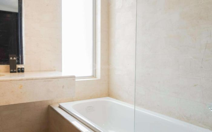 Exclusive 2BR @ The Empyreal Apartment By Travelio