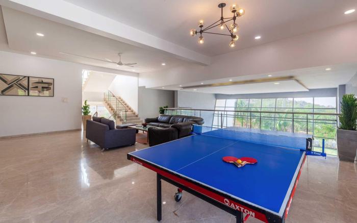 StayVista's White Pebbles with Theater Room