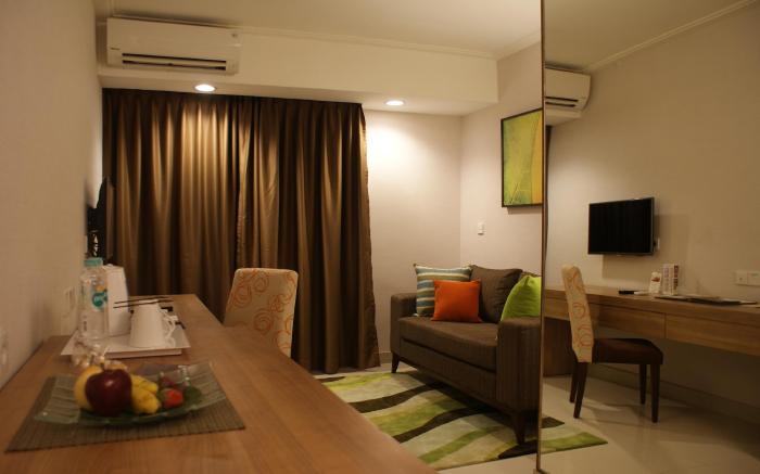 Grand Tropic Suites Hotel