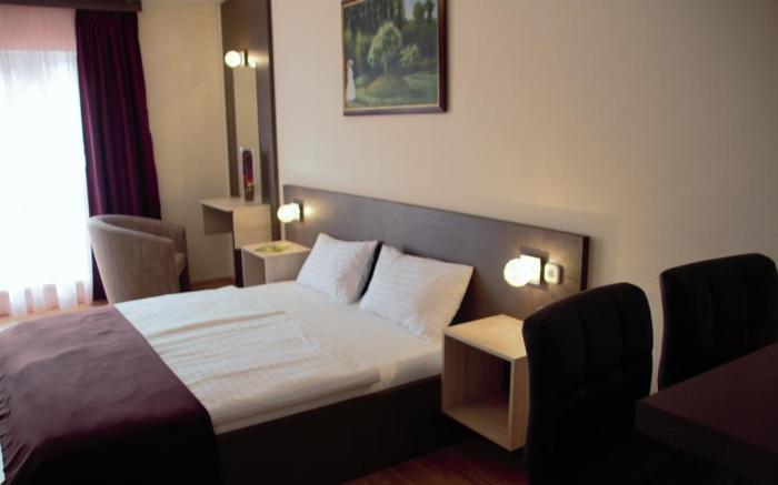 Triple M Hotel