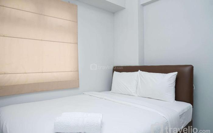 Tranquil Green Pramuka 2BR Apartment By Travelio