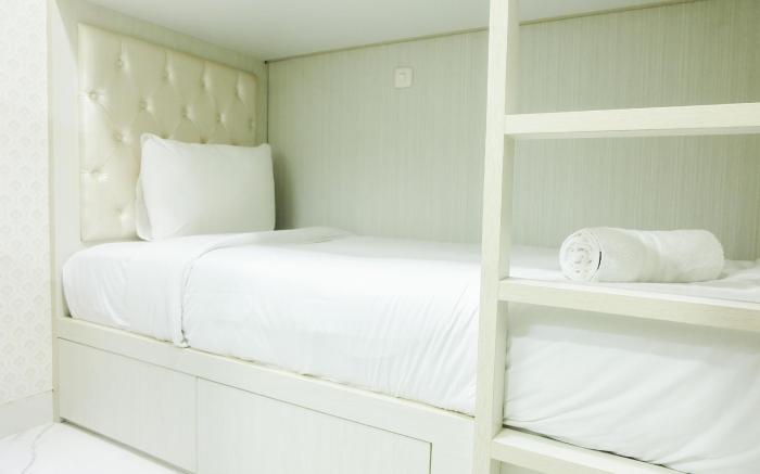 Posh 2BR Apartment at Bassura City By Travelio