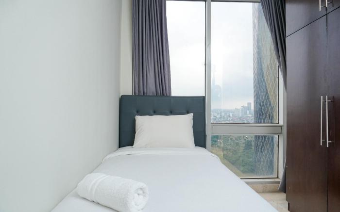 New 2BR at The Empyreal Epicentrum Apt By Travelio
