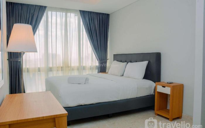 Comfy 2BR at The Masterpiece Apartment By Travelio