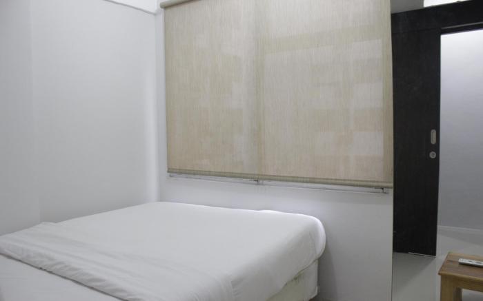 Bright 2BR The Jarrdin Cihampelas By Travelio