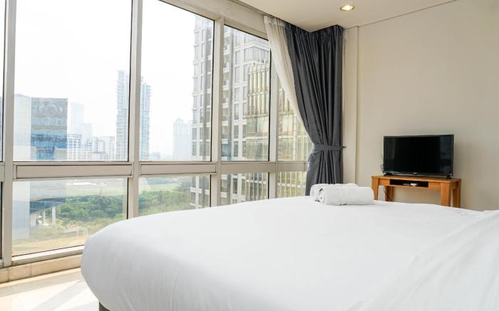 Elegant 2BR The Masterpiece Apartment By Travelio