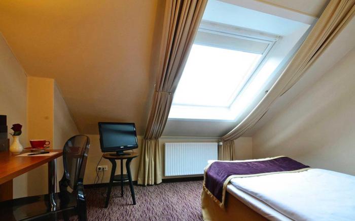 Comfort Hotel tom Kyle