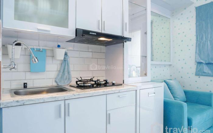 Best Comfy 2BR Green Pramuka Apartment By Travelio