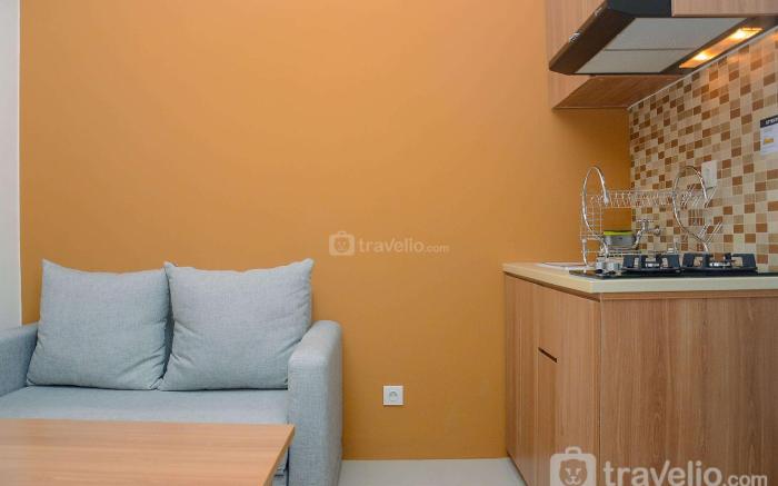 Trendy 2BR Green Pramuka Apartment By Travelio