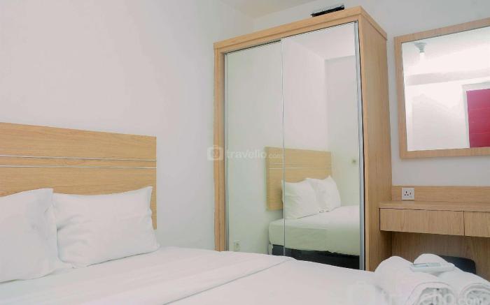Furnished 2BR Bassura City Apartment By Travelio