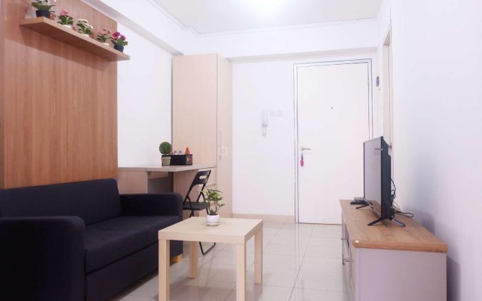 Cozy 2BR Baywalk Green Bay Apartment By Travelio