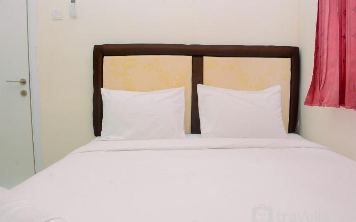 Relax 2BR Green Pramuka City Apartment By Travelio