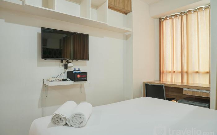 Chic and Cozy Studio at Tifolia Apartment By Travelio